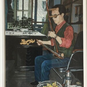 man sits at table